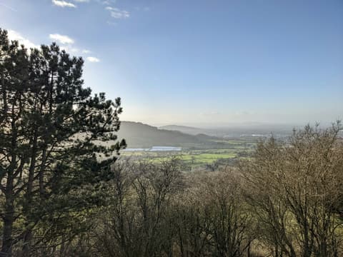 A wooded valley viewed from a hill near Birdlip in the Cotswolds