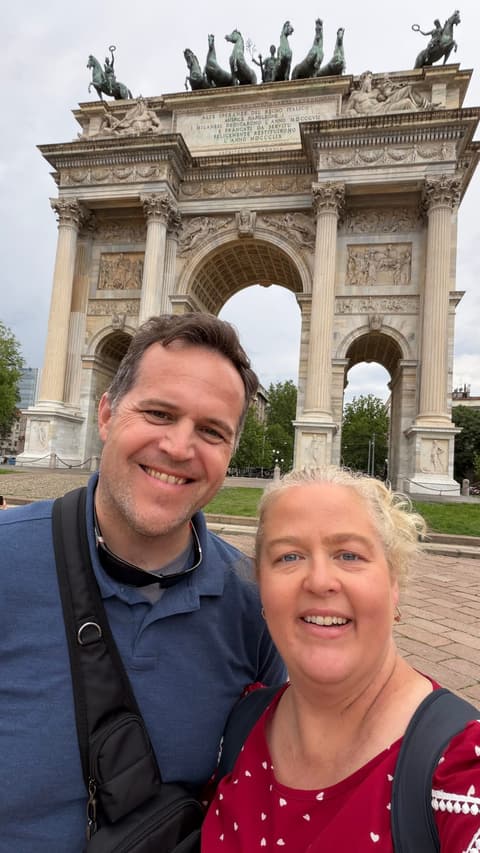 Michelle and her husband in front of the Arco della Pace in Milan, Italy