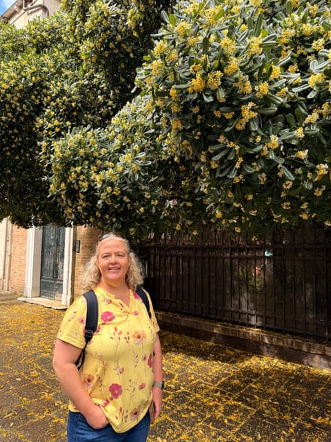 Michelle smiling at a scenic destination